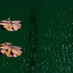 Green, not gold, color of the day at Olympic diving pool